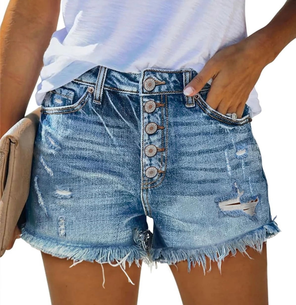 Denim shorts with button details worn by a person on a white background