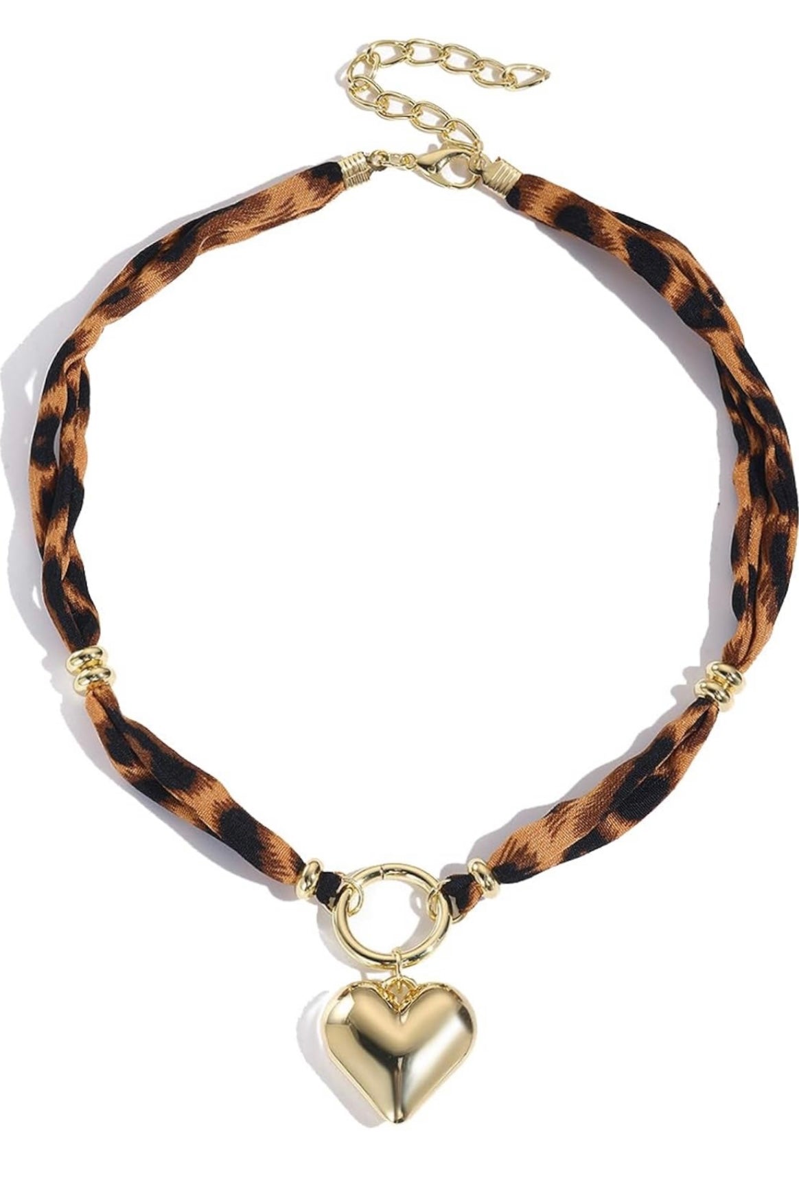 A braided choker necklace featuring a brown and black leopard print pattern with polished gold-tone hardware, including a heart-shaped pendant, ring clasp, and extension chain.