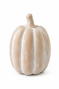 A decorative faux pumpkin ornament with a textured, ribbed surface in a warm beige and white mottled pattern, shown on a solid white background.