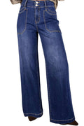 A pair of high-waisted, wide-leg blue denim jeans with a button fly and contrast stitching, shown on a white background.