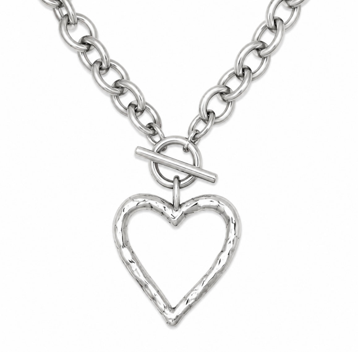 A silver chain necklace featuring a textured, open heart-shaped pendant with a toggle clasp, shown against a plain white background.